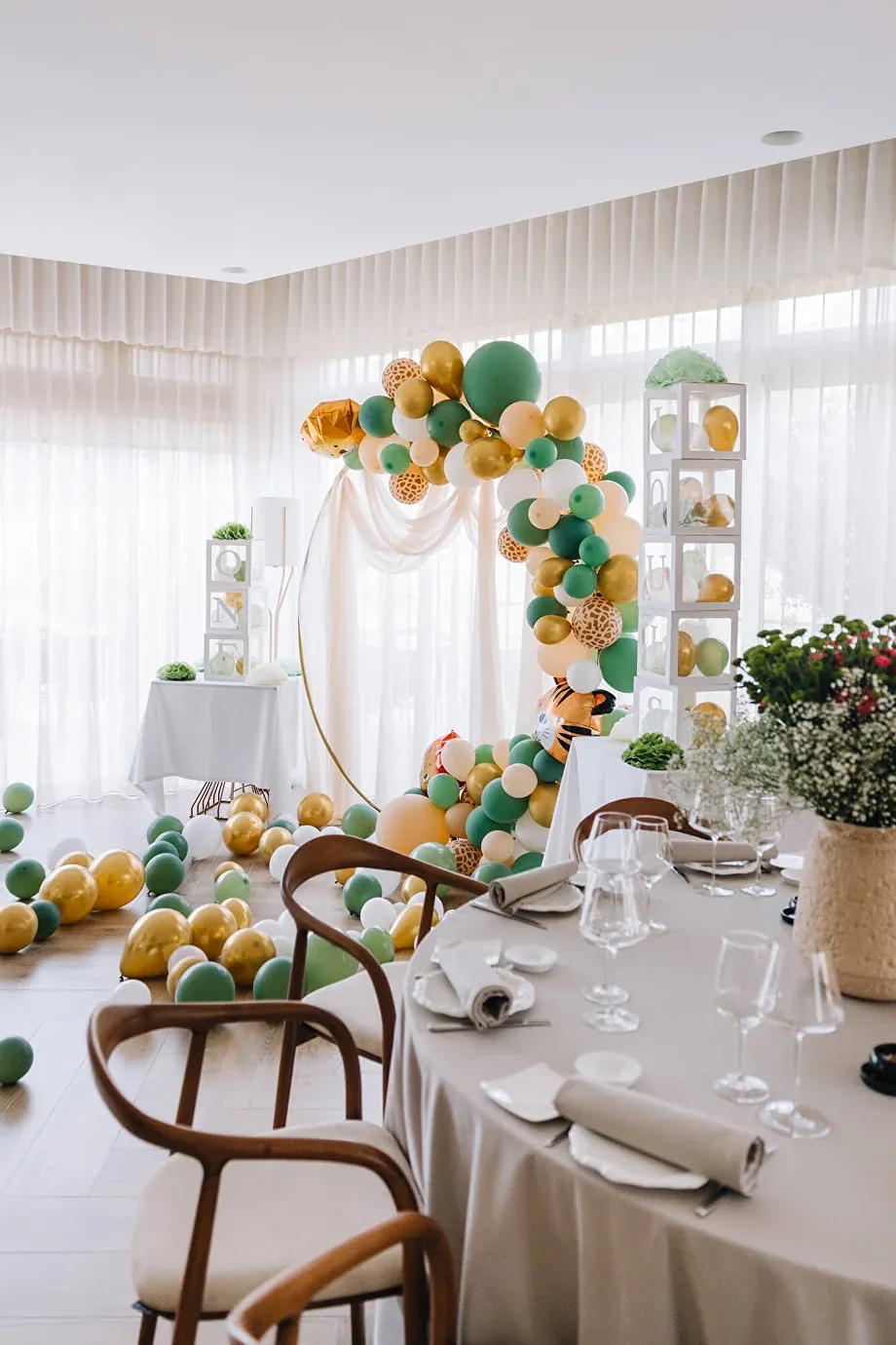 The dining room decorated with a balloon arch for a private celebration