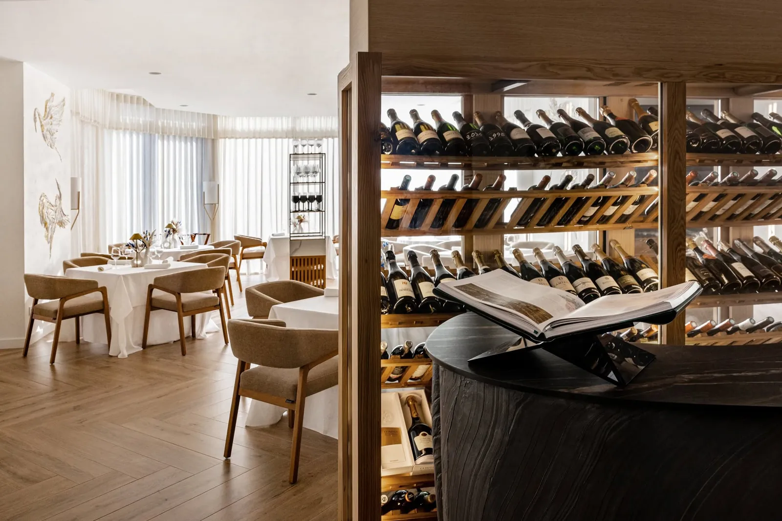 Dining room and wine cellar with an open wine book