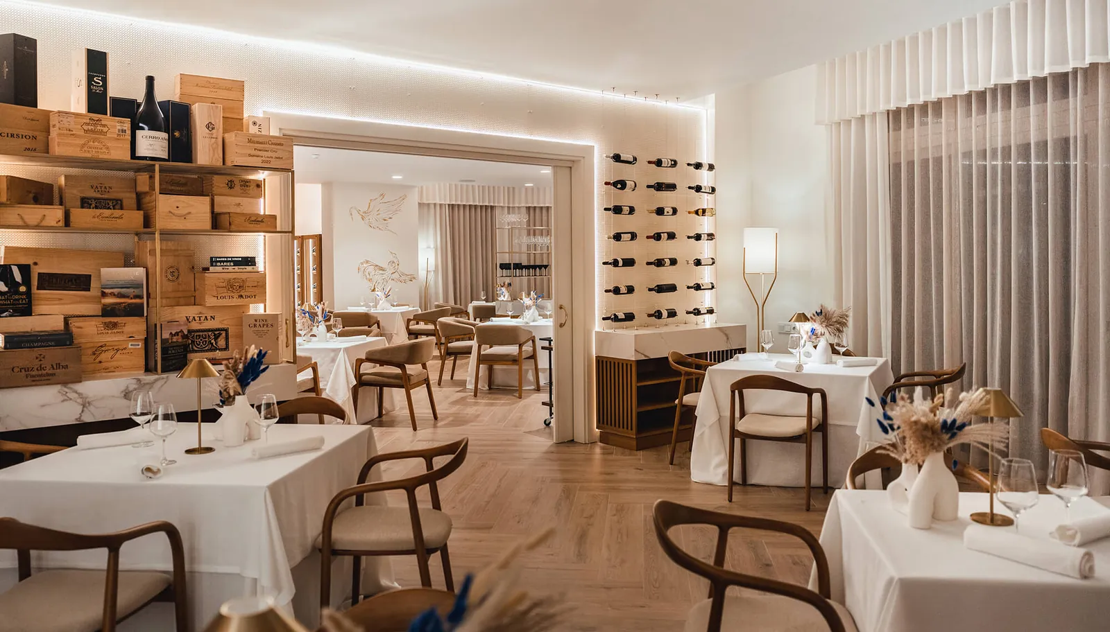 The length of the dining room towards the wine wall